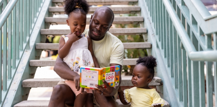 dad-reads-to-preschooler-toddler